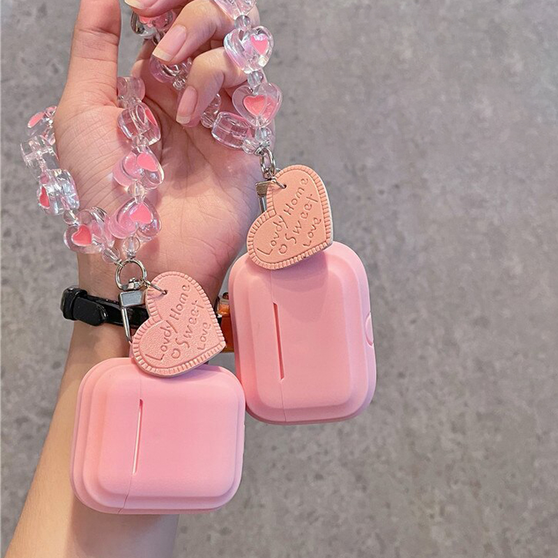Soft Pink AirPods Case With Heart Bracelet