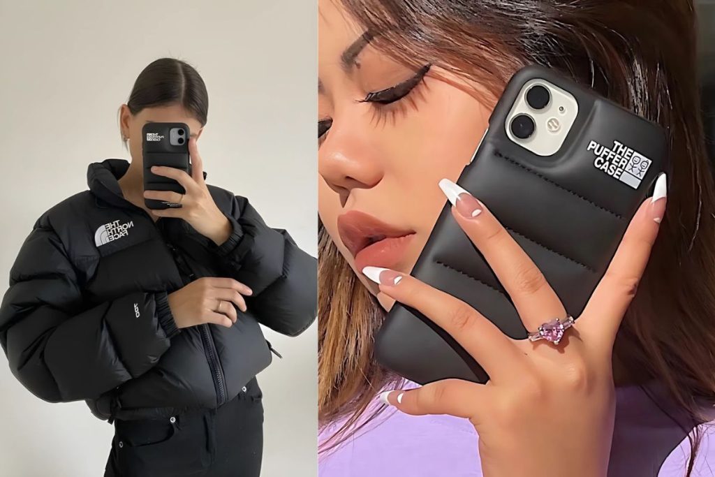 A lifestyle photo of someone holding an iPhone with a Puffer case
