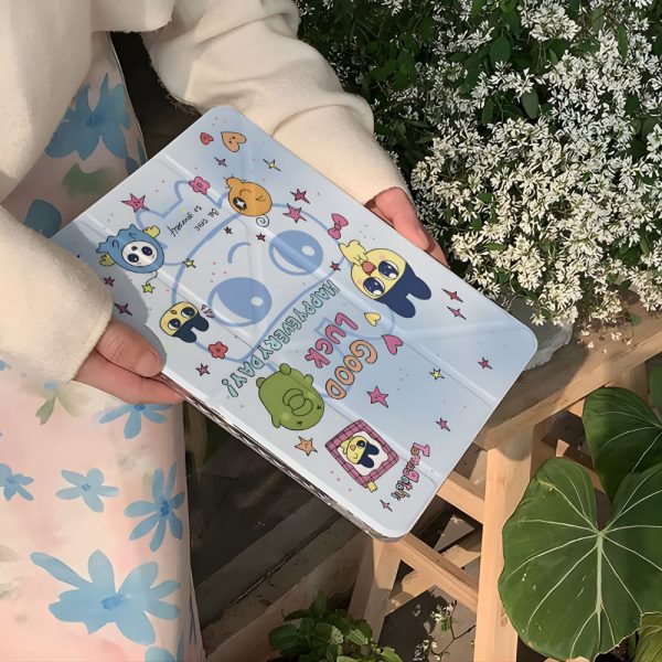 cute tamagotchi ipad case holding on hands