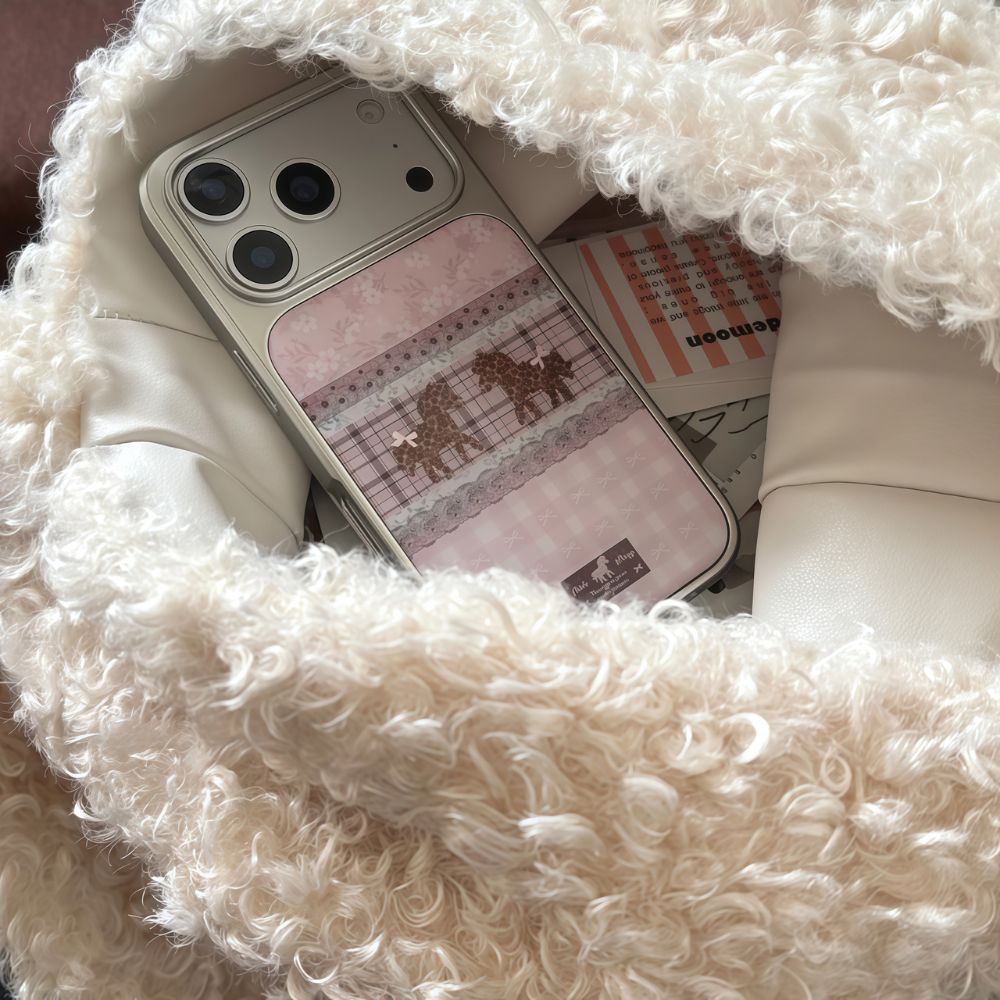 Vintage Pink Pony iPhone Case inside a white wool bag