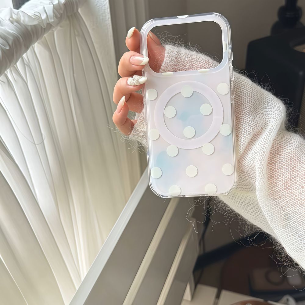 Gradient Polka Dot MagSafe iPhone Case featuring a soft pastel iridescent backdrop with raised white polka dots, a built-in MagSafe ring, and transparent protective edges.