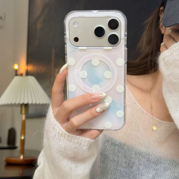 A woman holding an iPhone 17 Pro Max with Gradient Polka Dot MagSafe Phone Case